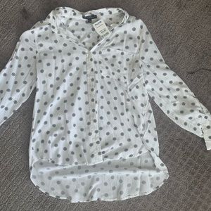 White blouse with black floral pattern